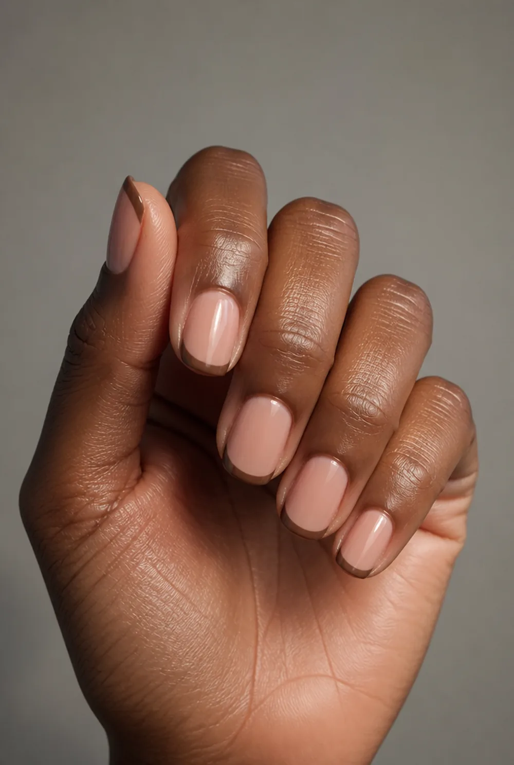 mocha french nail art on deep brown skin