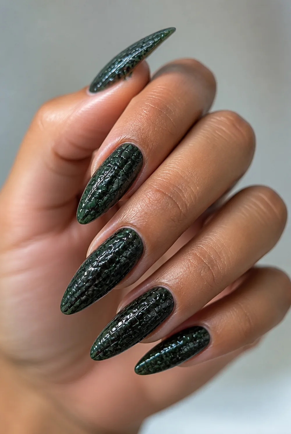 croc texture nail art on olive skin, long length