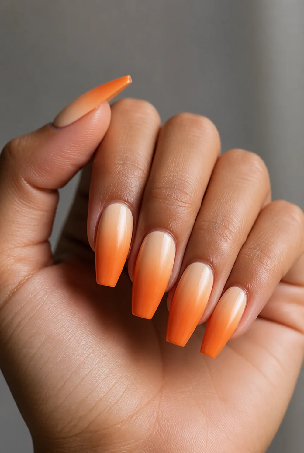 pumpkin spice ombre nail art on olive skin, long length