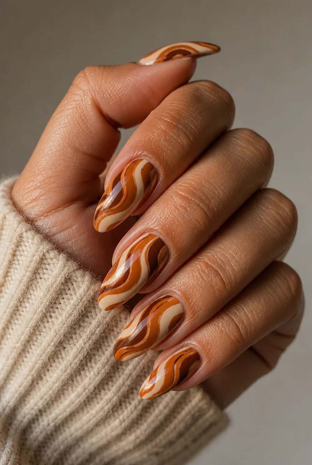 retro swirls nail art on olive skin, long length