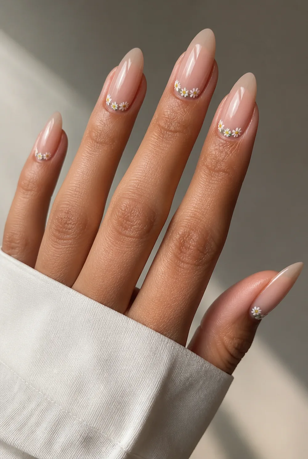 micro florals nail art on olive skin, long length