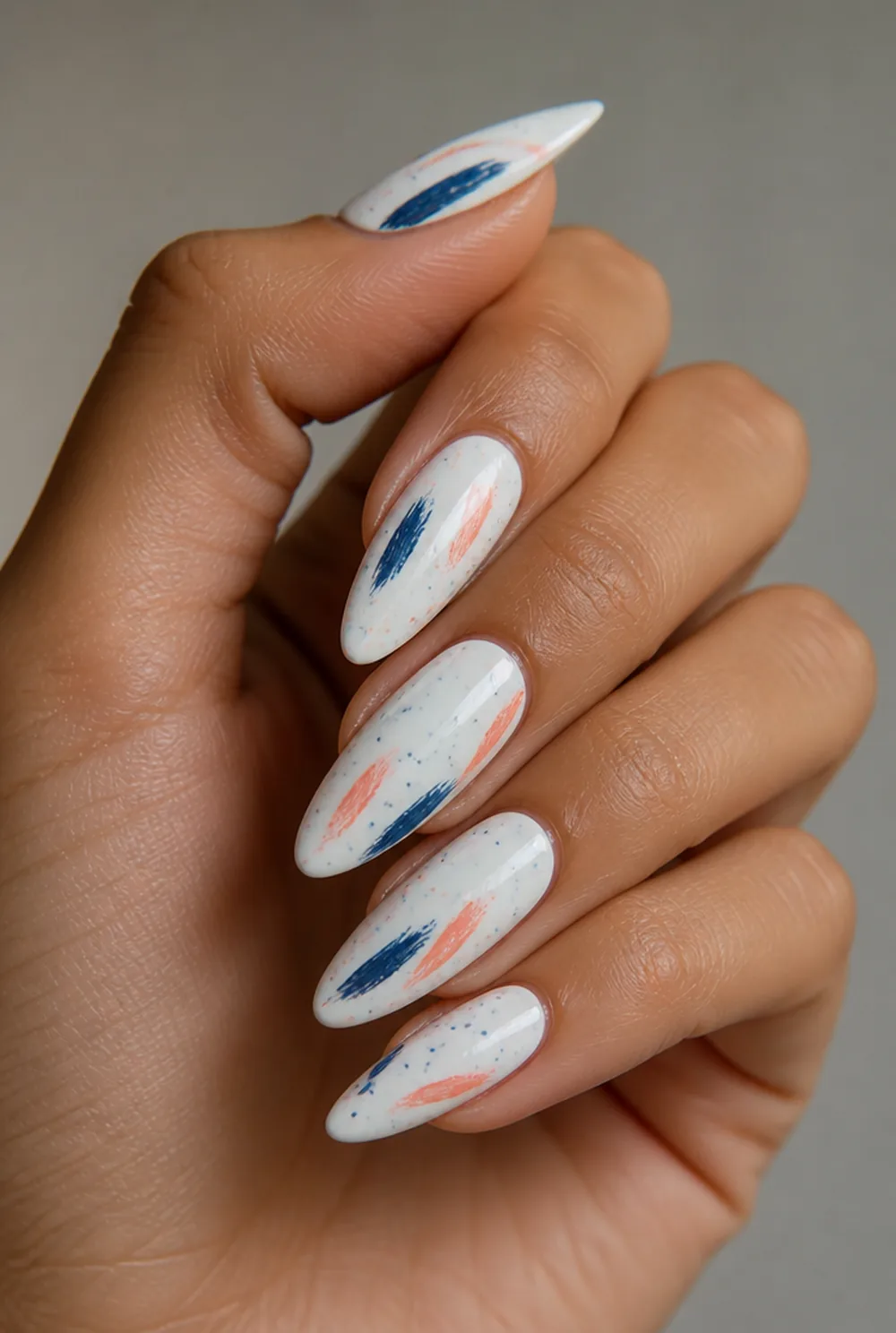 brushstroke splatter nail art on olive skin, long length