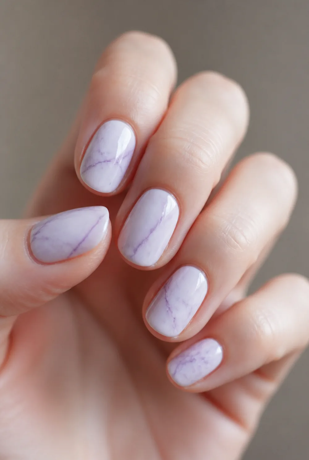 purple marble nail art on fair skin short length - PolishedAndPrettyNails.com purple marble nail art on fair skin, short length