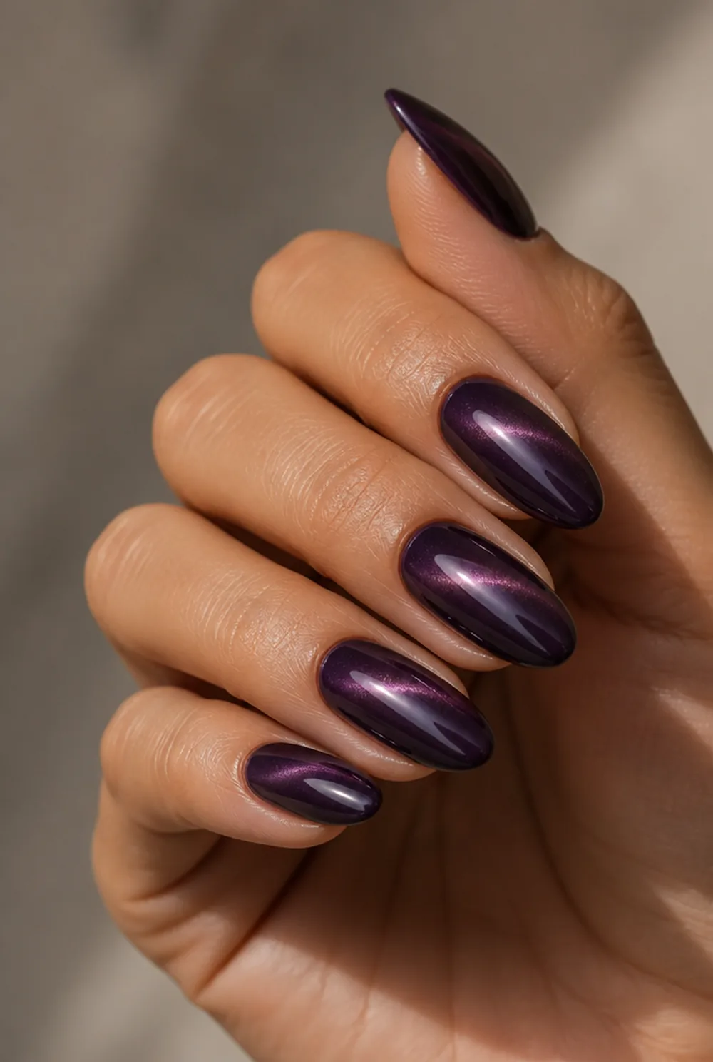 deep plum cat eye nail art on olive skin long length - PolishedAndPrettyNails.com deep plum cat eye nail art on olive skin, long length