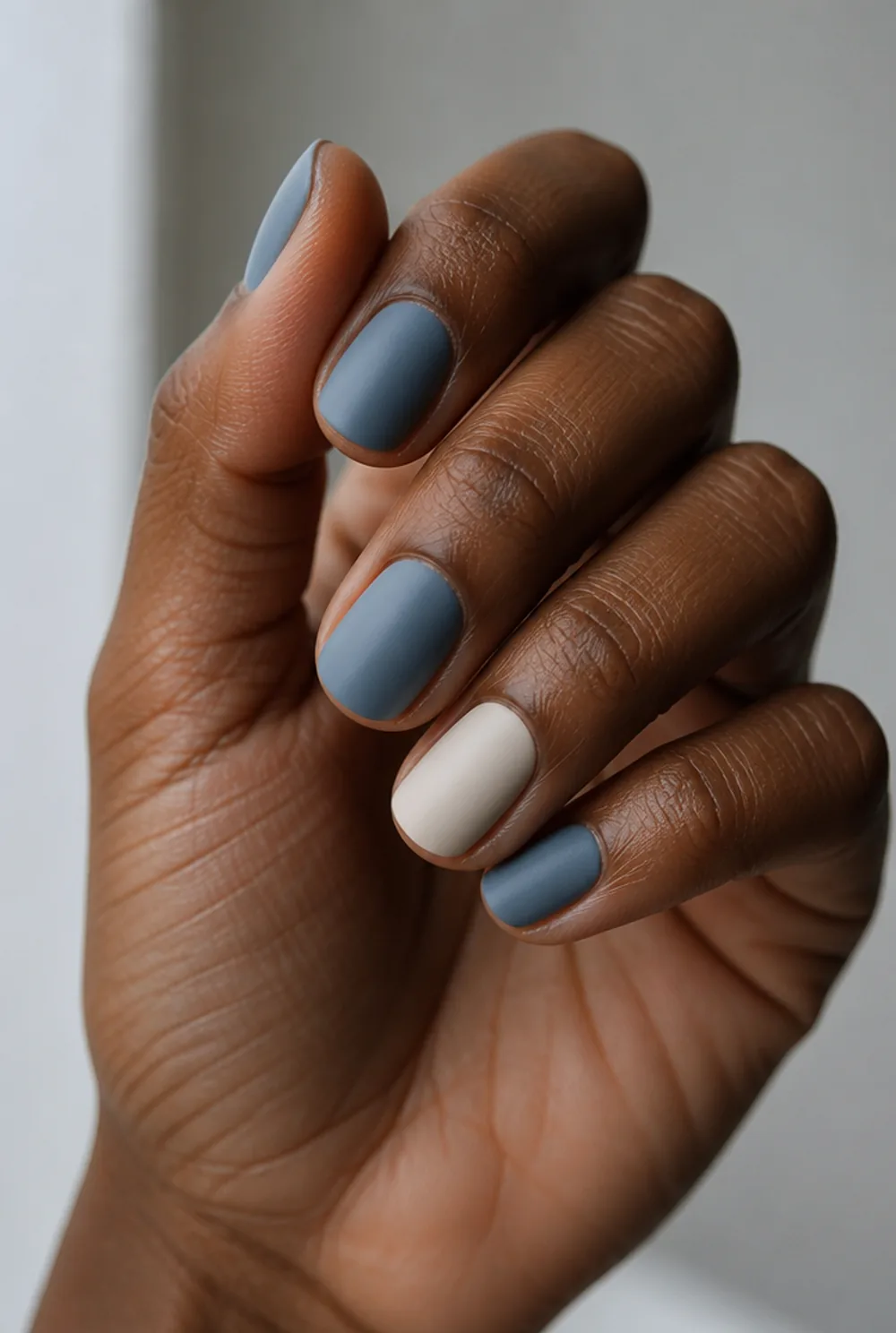 dusty blue nail art on deep brown skin - PolishedAndPrettyNails.com dusty blue nail art on deep brown skin