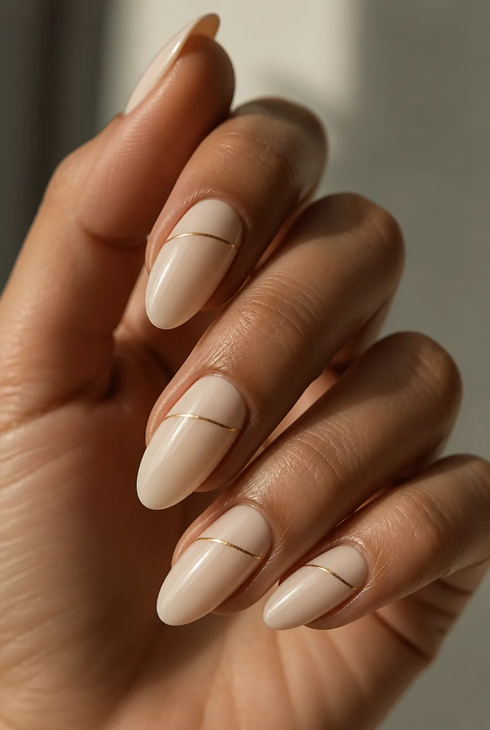minimal gold line art nail art on olive skin long length - PolishedAndPrettyNails.com minimal gold line art nail art on olive skin, long length