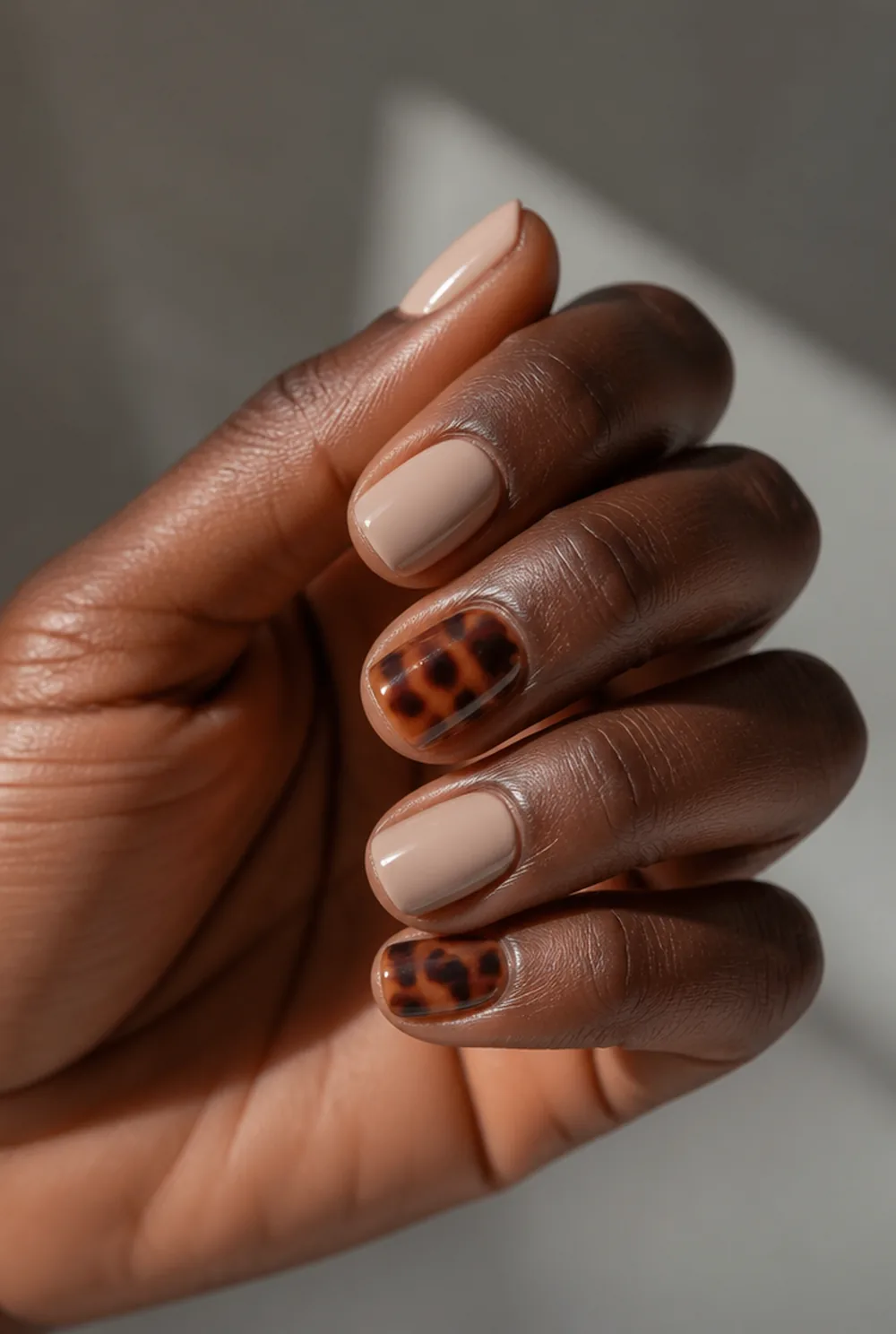 tiny tortoise accents nail art on deep brown skin - PolishedAndPrettyNails.com tiny tortoise accents nail art on deep brown skin