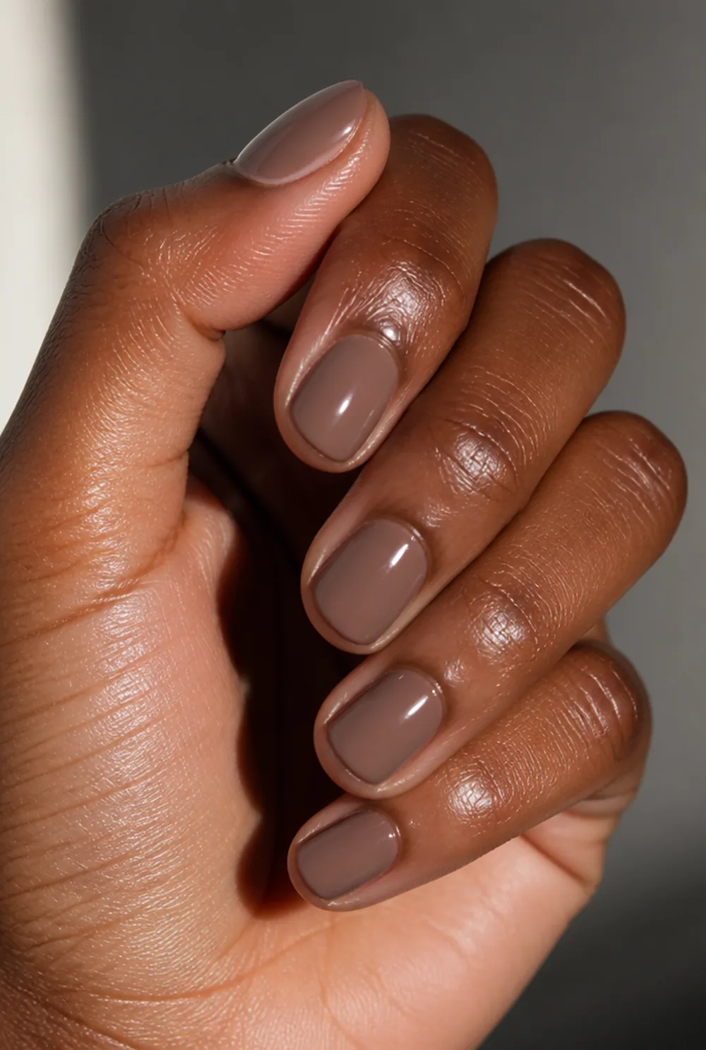 mocha cream nail art on deep brown skin