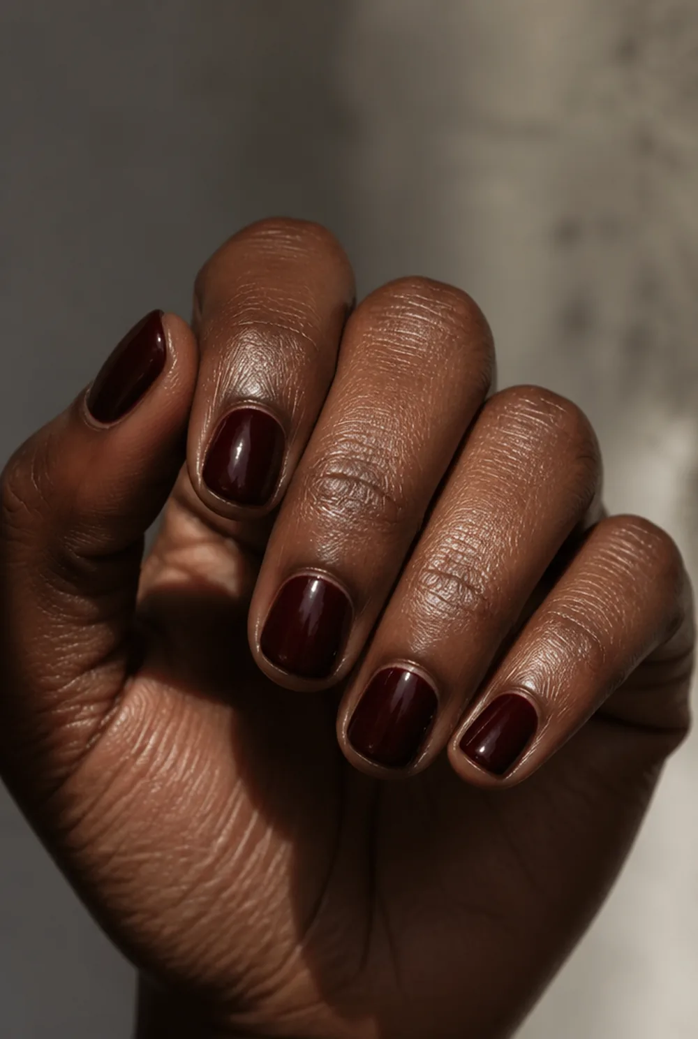 burgundy depth nail art on deep brown skin