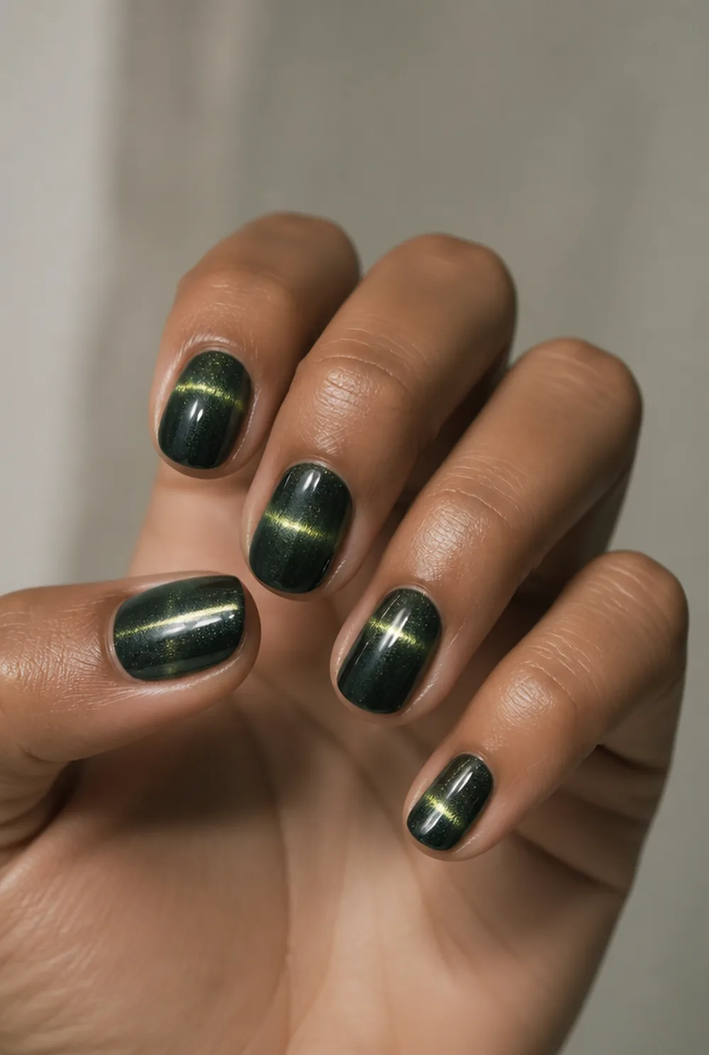 cat eye on short nail art on olive skin, long length