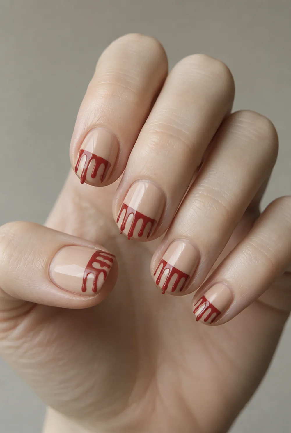 blood-drip tips with a bobby pin nail art on fair skin short length - PolishedAndPrettyNails.com blood-drip tips with a bobby pin nail art on fair skin, short length