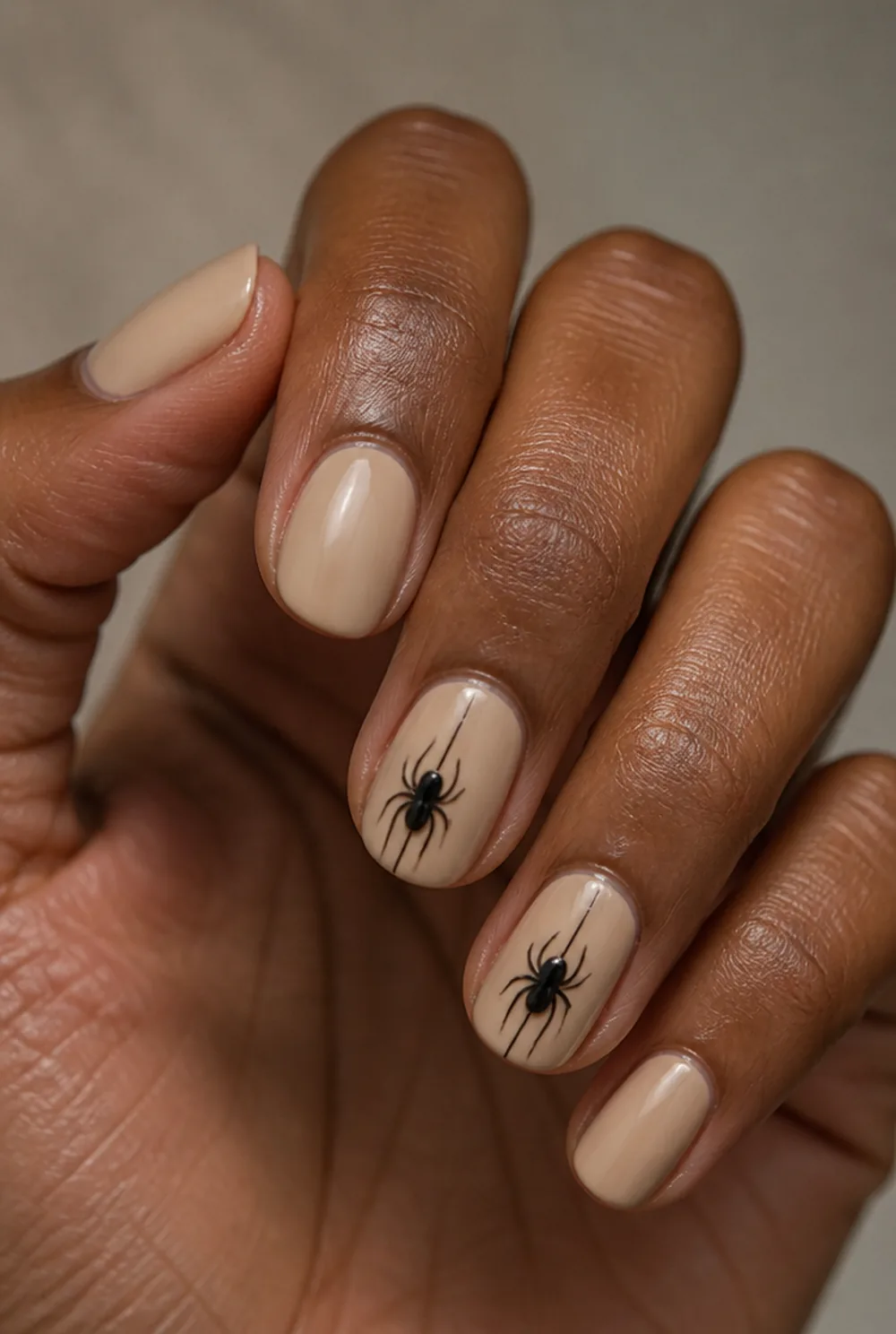polka-dot spiders nail art on deep brown skin - PolishedAndPrettyNails.com polka-dot spiders nail art on deep brown skin