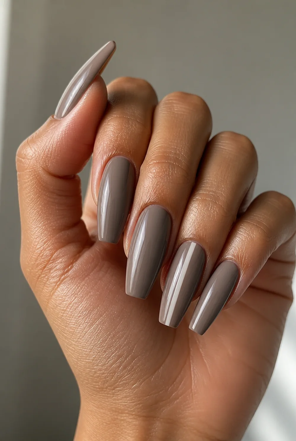 one-stripe accent nail art on olive skin, long length