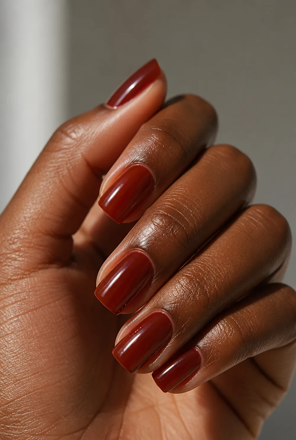 cherry cola brown nail art on deep brown skin