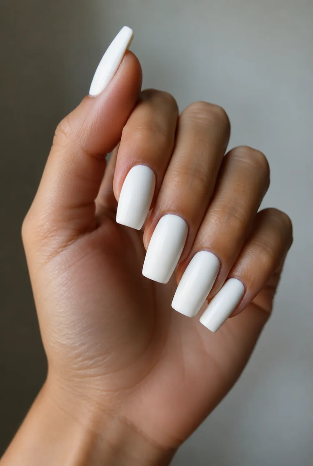white square nail art on olive skin, long length