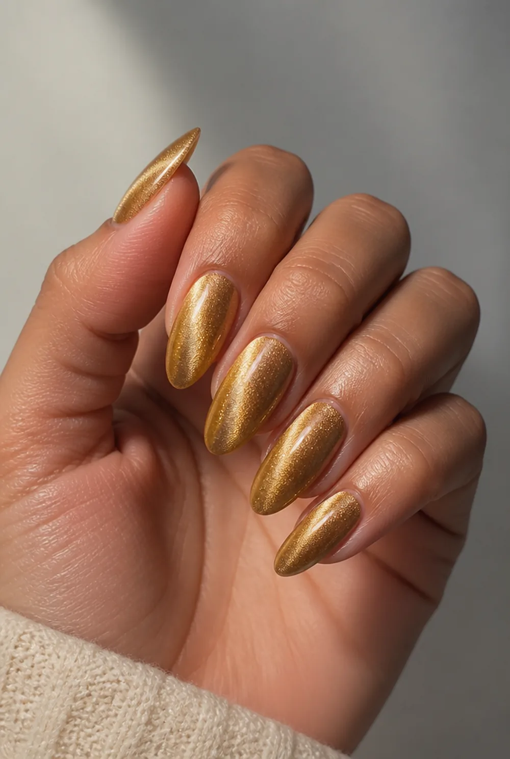 wheat-gold cat eye nail art on olive skin long length - PolishedAndPrettyNails.com wheat-gold cat eye nail art on olive skin, long length