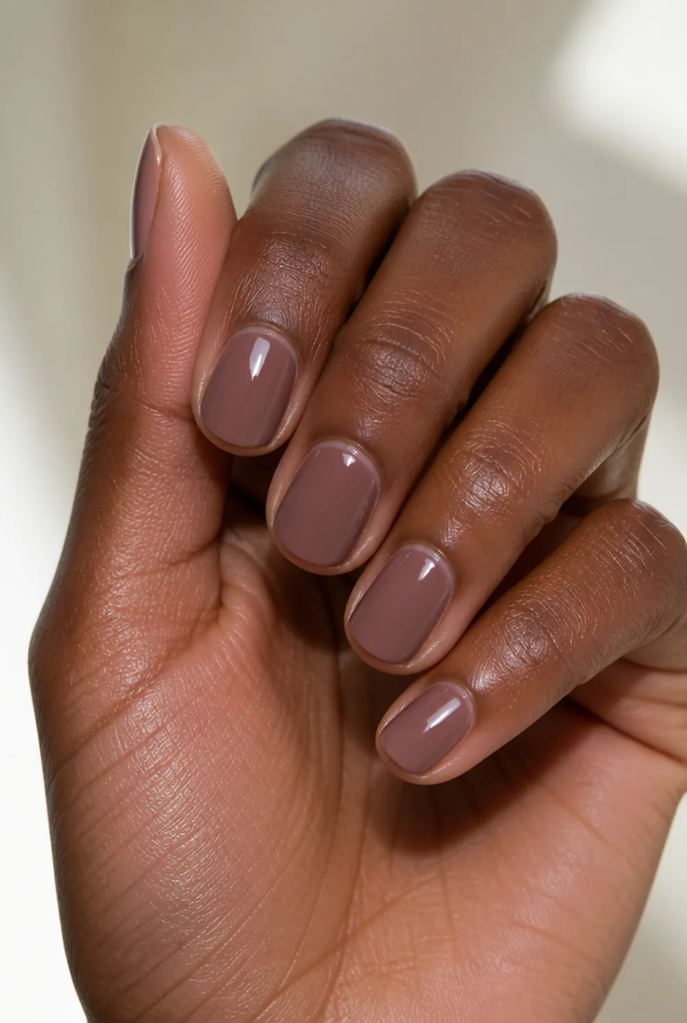 short rounded family-dinner set nail art on deep brown skin - PolishedAndPrettyNails.com short rounded family-dinner set nail art on deep brown skin