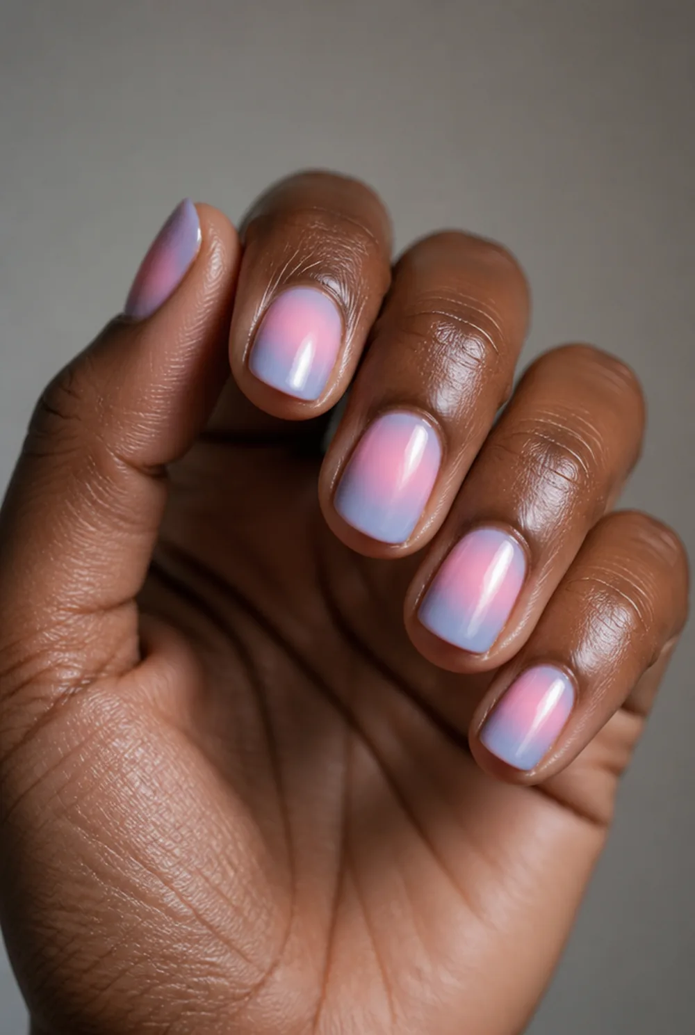 double aura nail art on deep brown skin