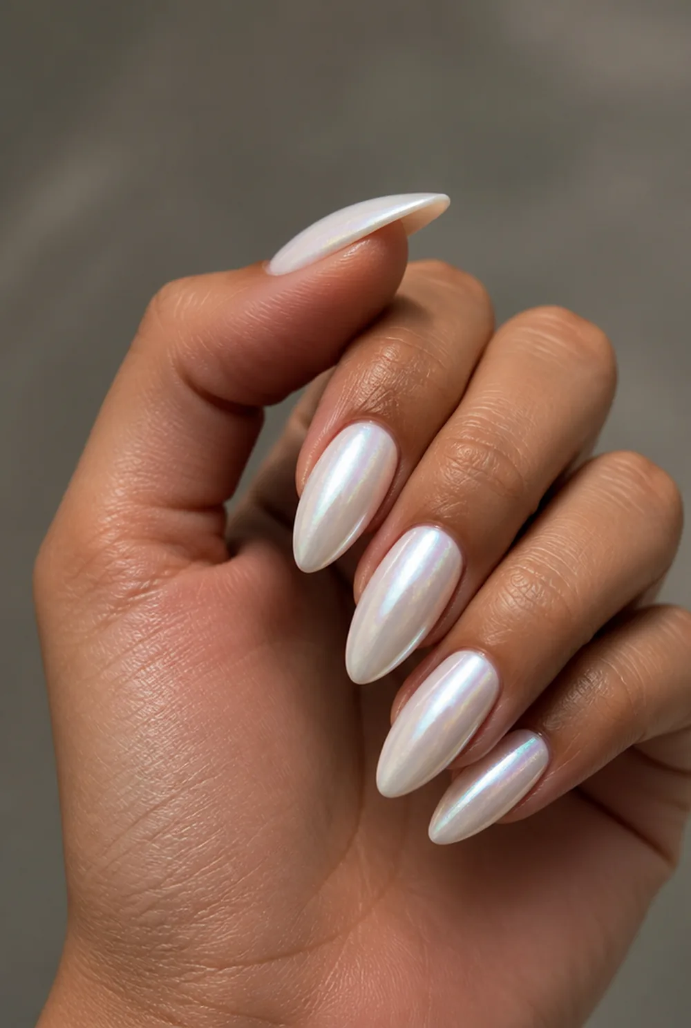 pearl glaze nail art on olive skin, long length