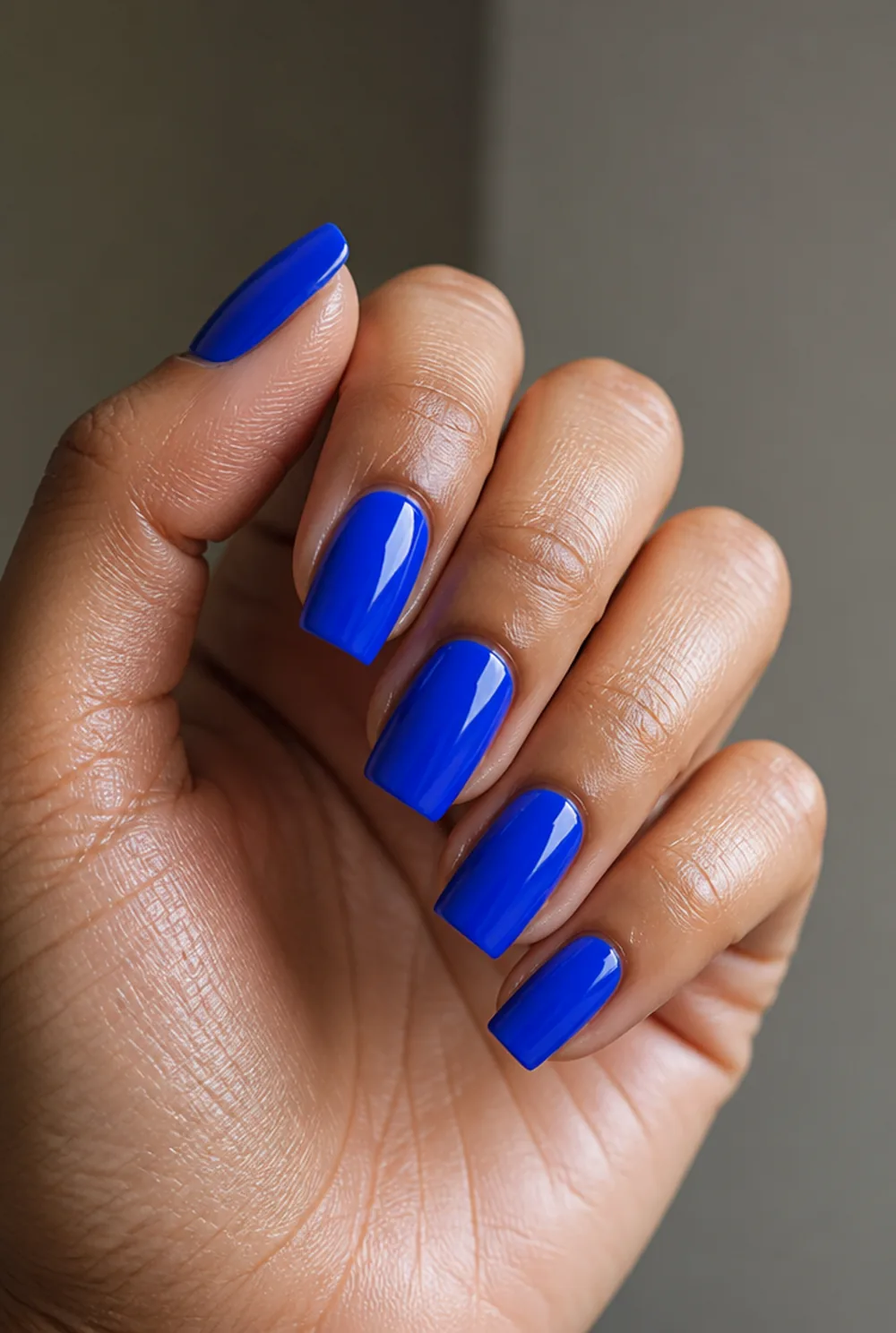 cobalt blue nail art on olive skin, long length