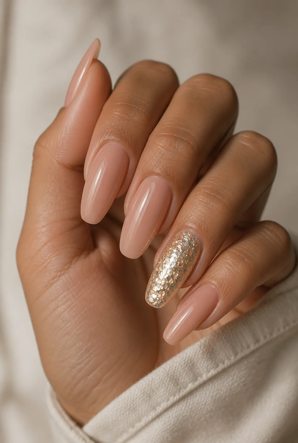 disco ball accent nail art on olive skin, long length