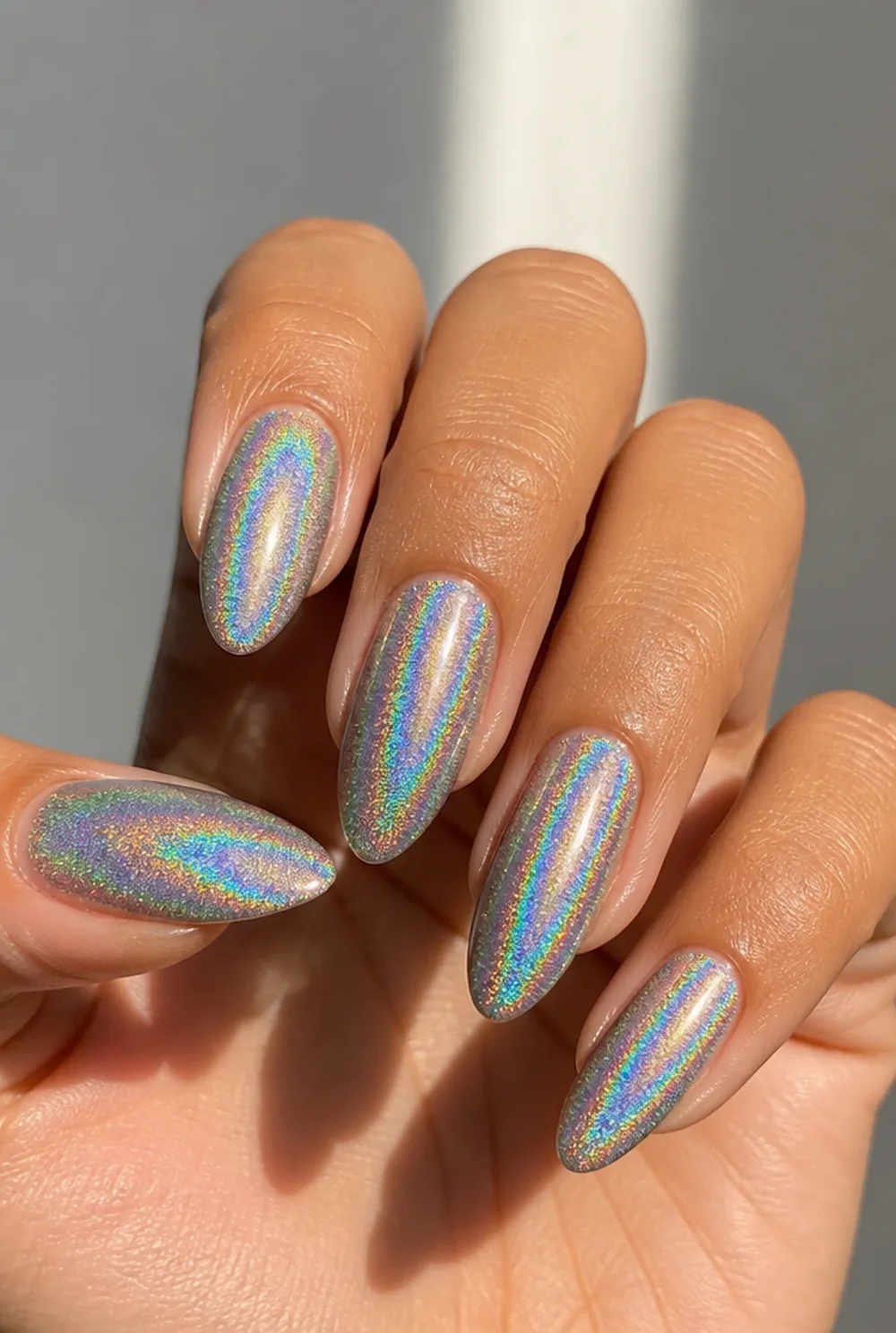 holographic topper nail art on olive skin, long length