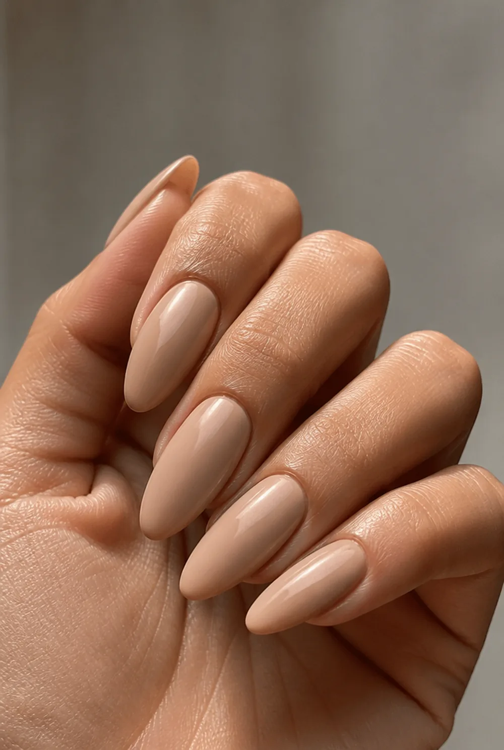 long nude almond nail art on olive skin, long length