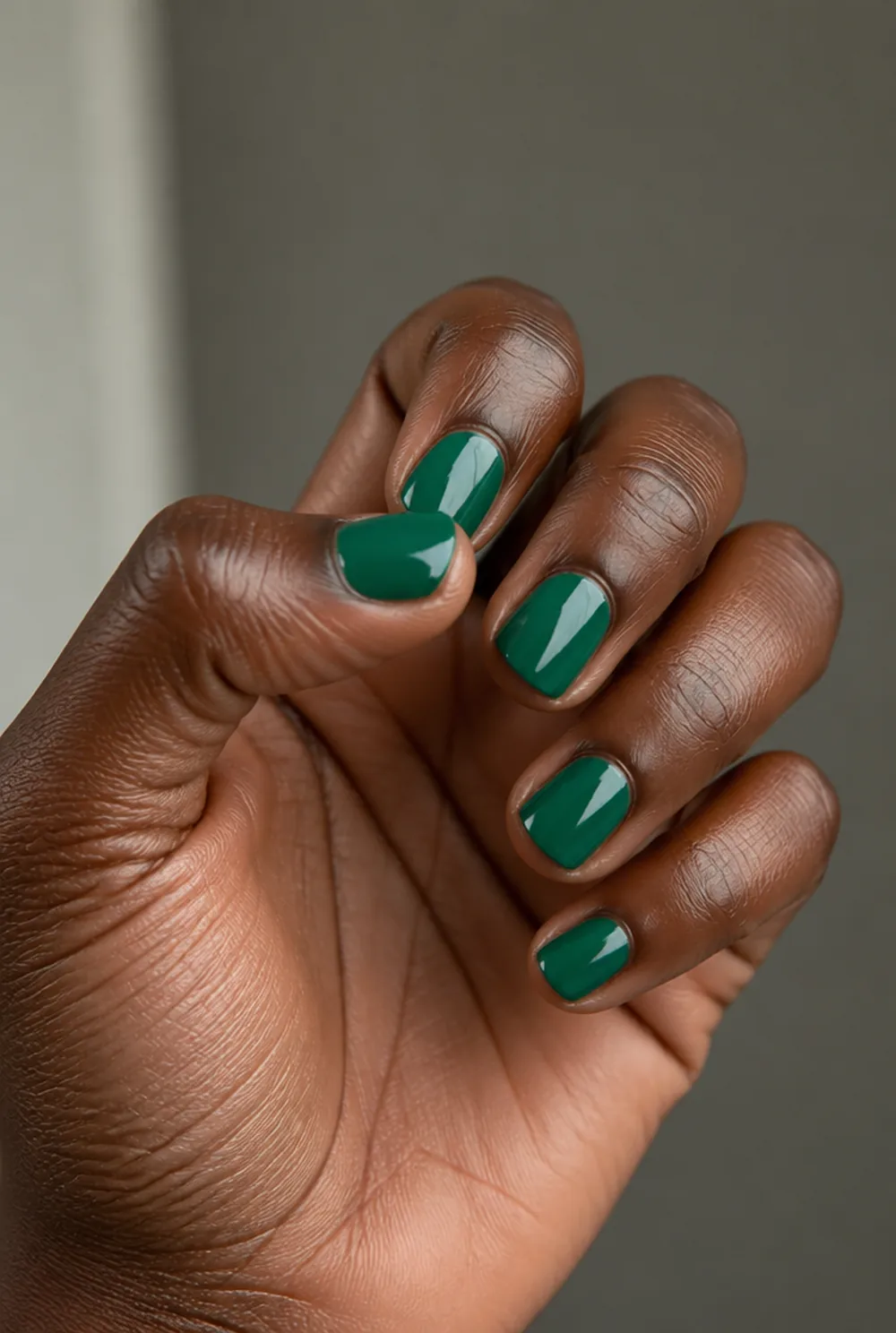 emerald jewel nail art on deep brown skin