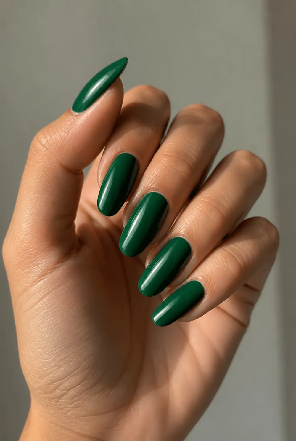 emerald jewel nail art on olive skin, long length