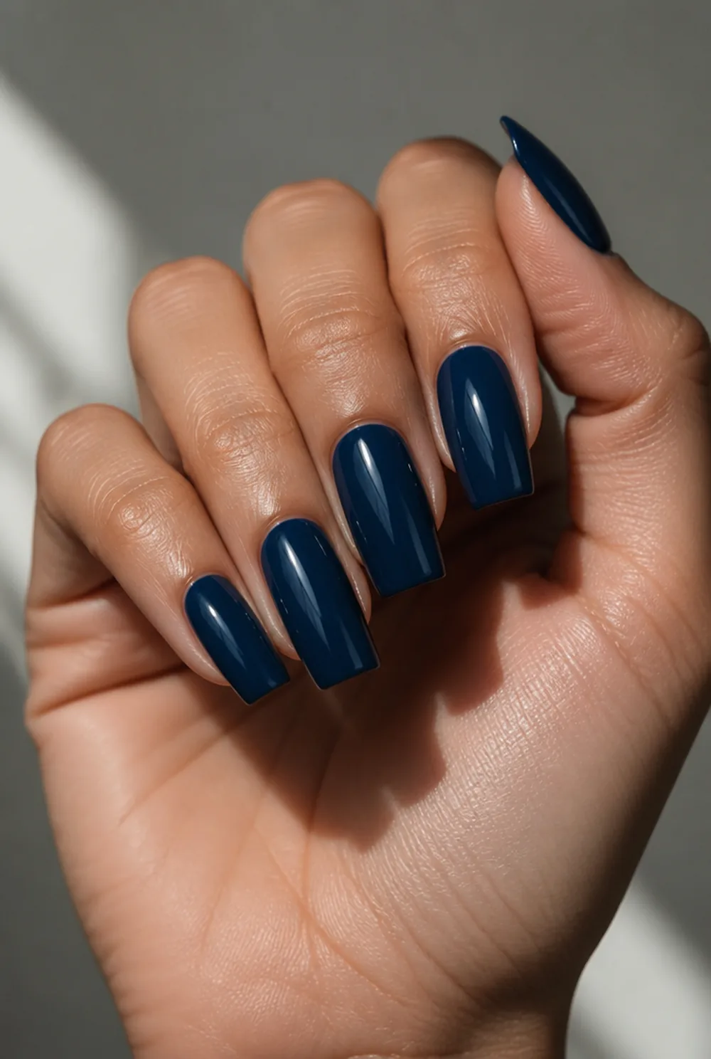 midnight navy creme nail art on olive skin, long length