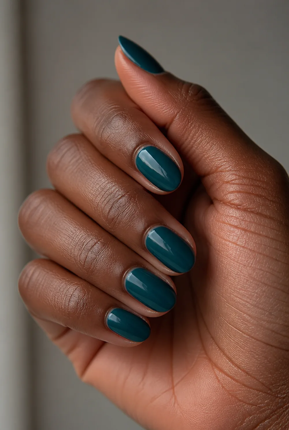 teal deep nail art on deep brown skin