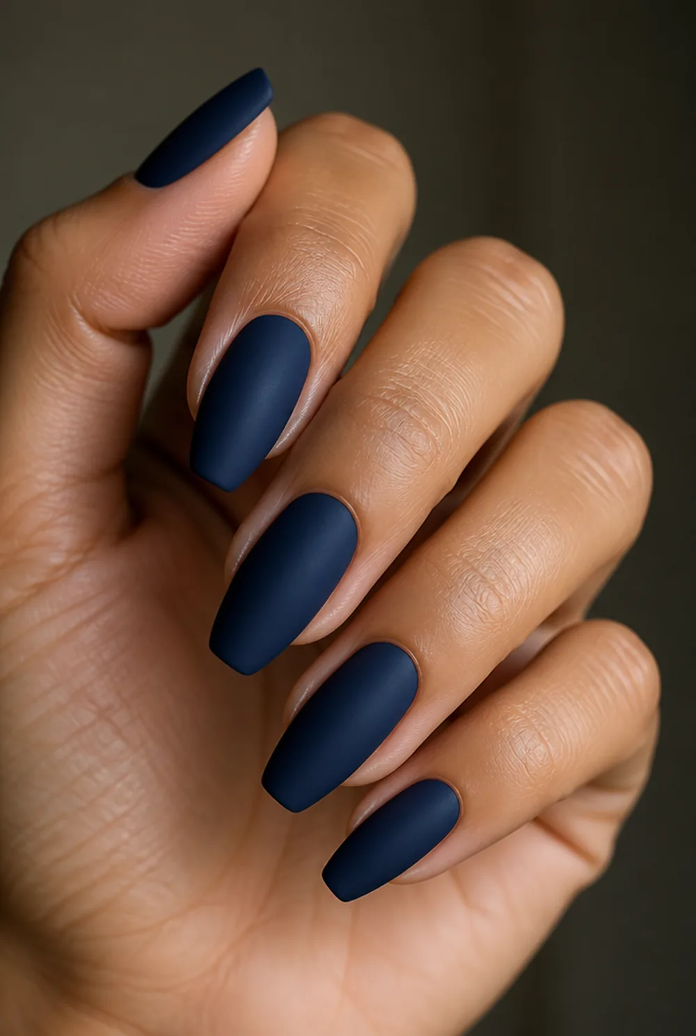 navy velvet matte nail art on olive skin, long length