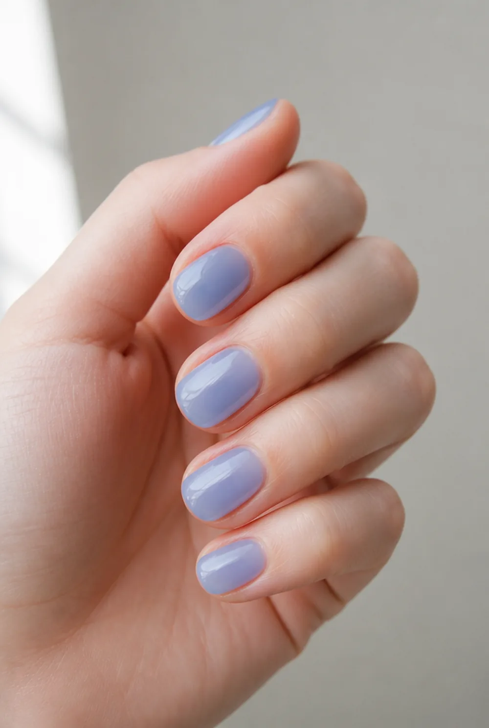 blue jelly nail art on fair skin, short length