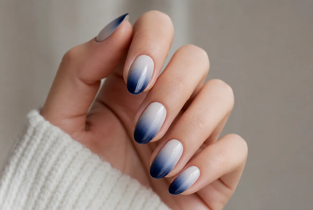 blue ombre nails fading from white to deep blue