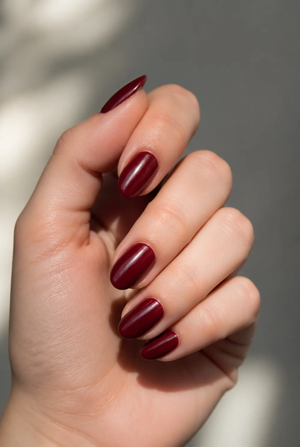 burgundy almond long nail art on fair skin short length - PolishedAndPrettyNails.com burgundy almond long nail art on fair skin, short length