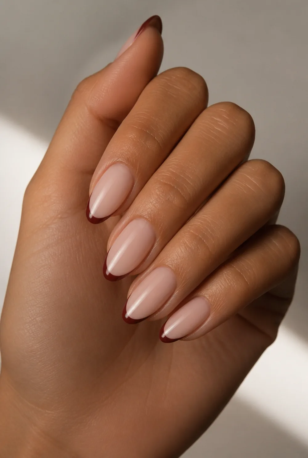 burgundy french tip nail art on olive skin long length - PolishedAndPrettyNails.com burgundy french tip nail art on olive skin, long length