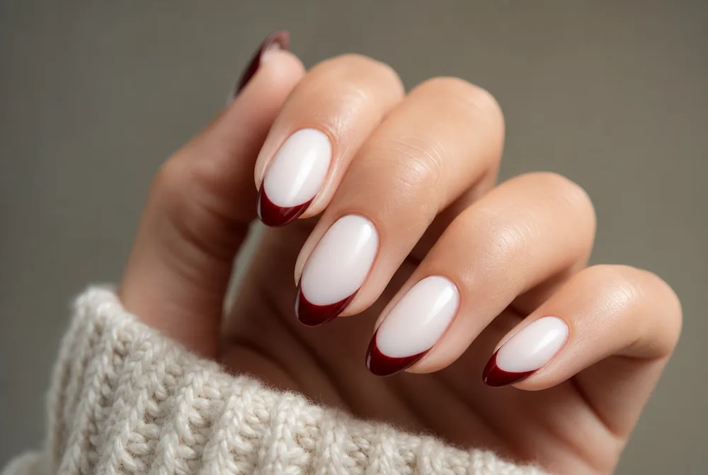burgundy tips on milky white nail base