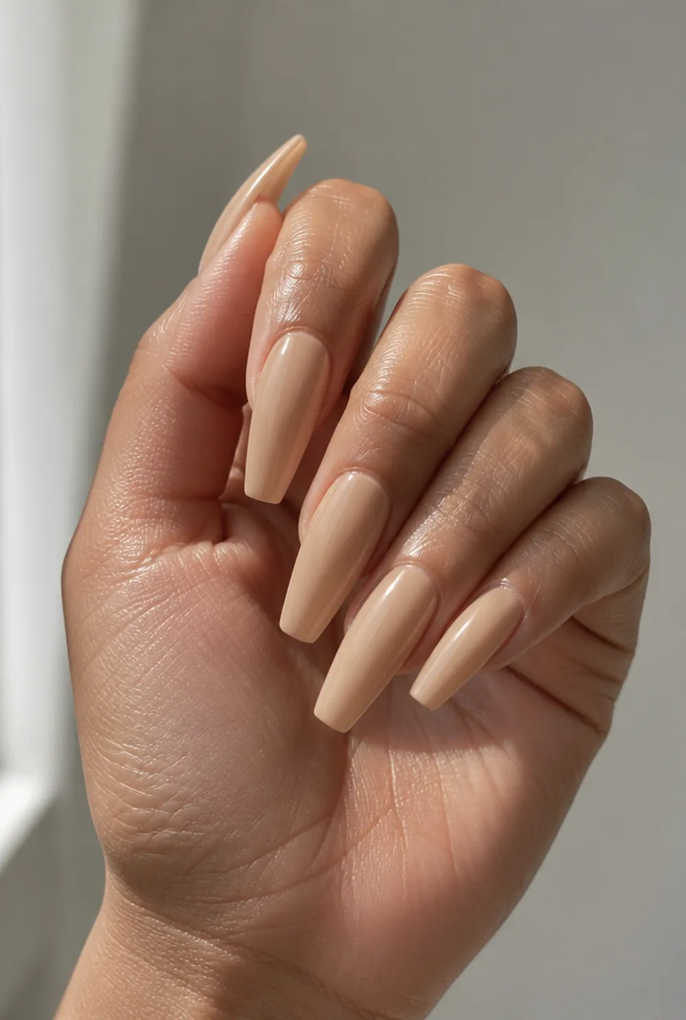 long nude coffin nail art on olive skin, long length