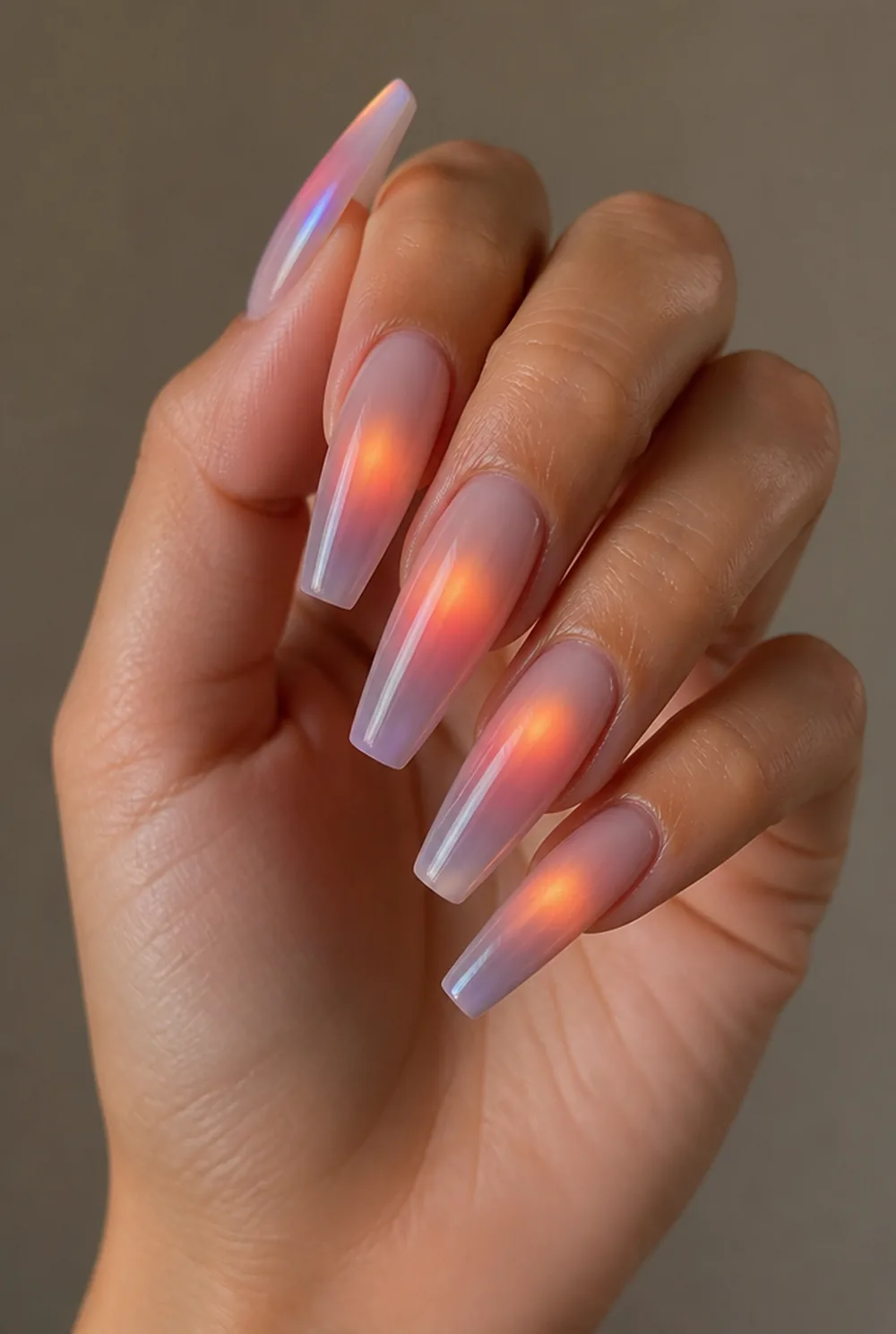 coffin aura nail art on olive skin, long length