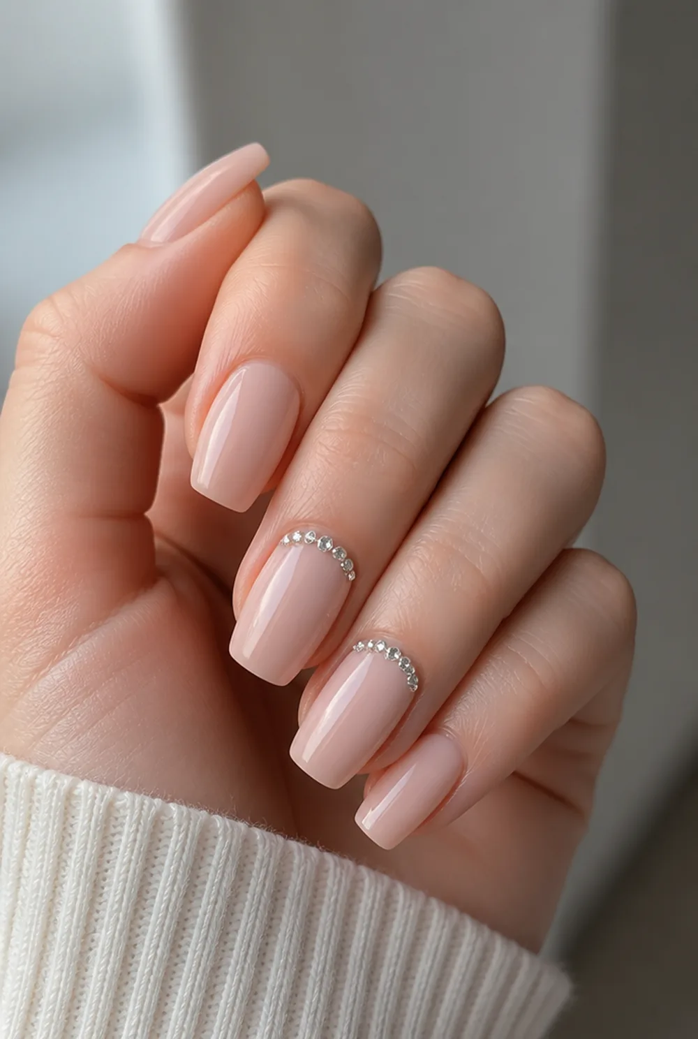 coffin with rhinestone cuff nail art on fair skin, short length