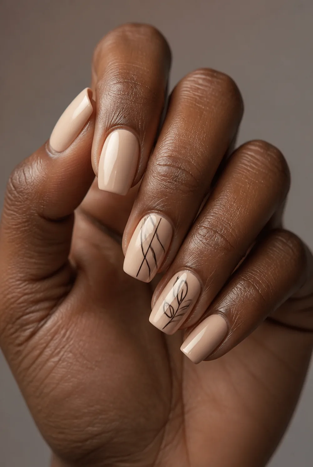 coffin line art nail art on deep brown skin