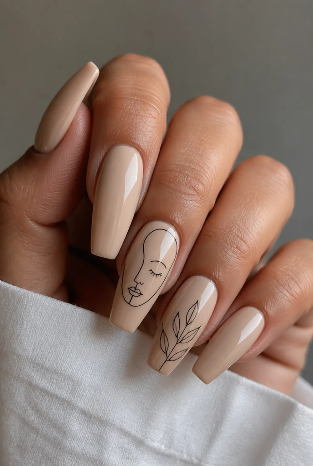 coffin line art nail art on olive skin, long length