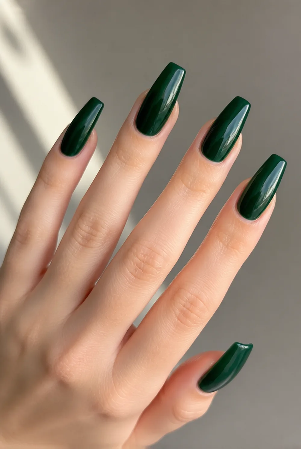 emerald coffin nail art on fair skin, short length
