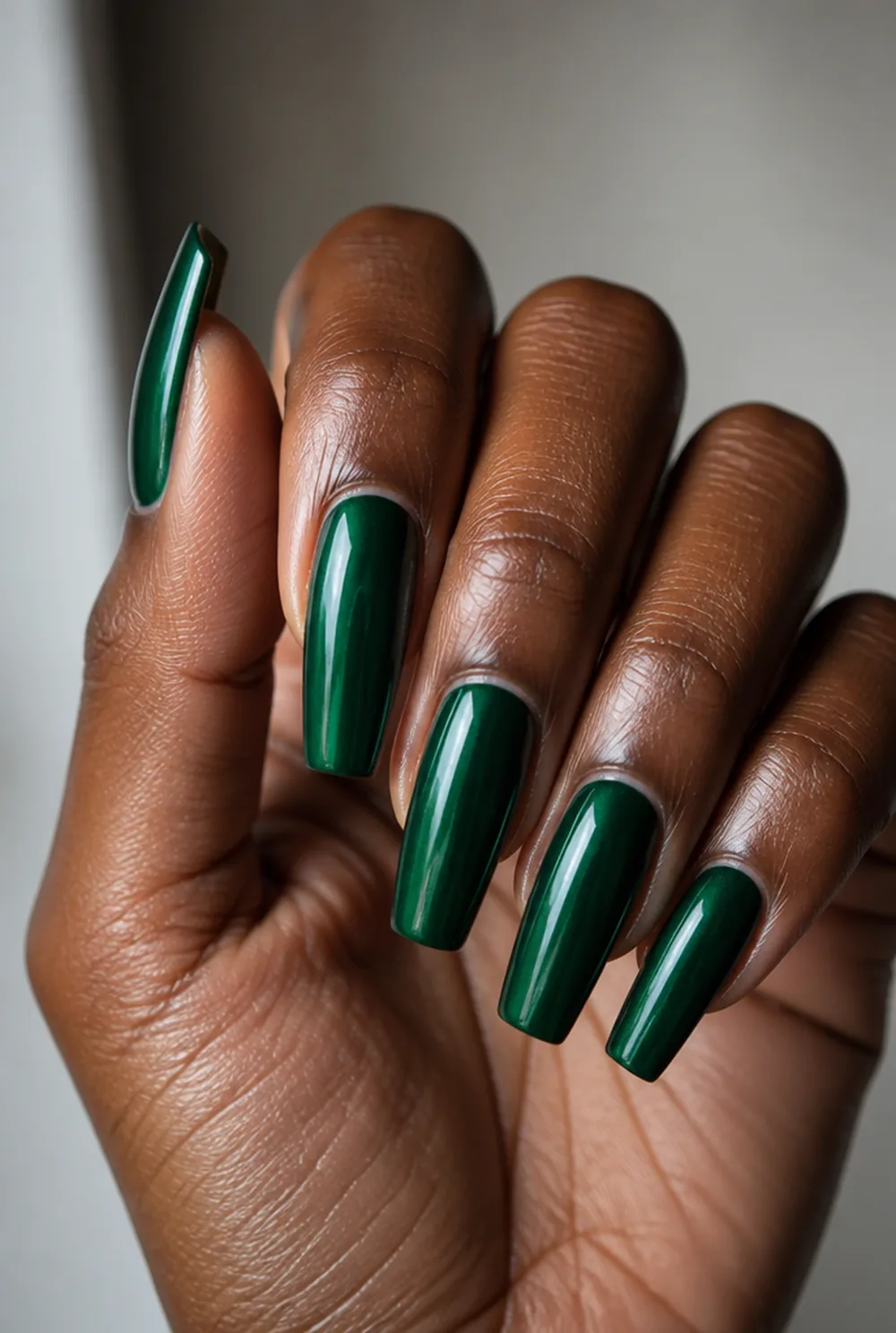 emerald coffin nail art on deep brown skin