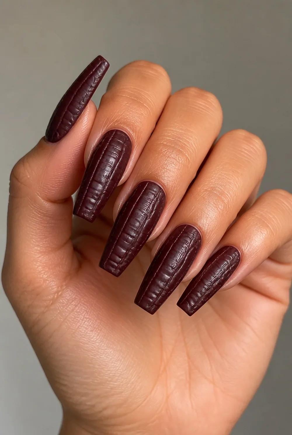 coffin croc print nail art on olive skin, long length