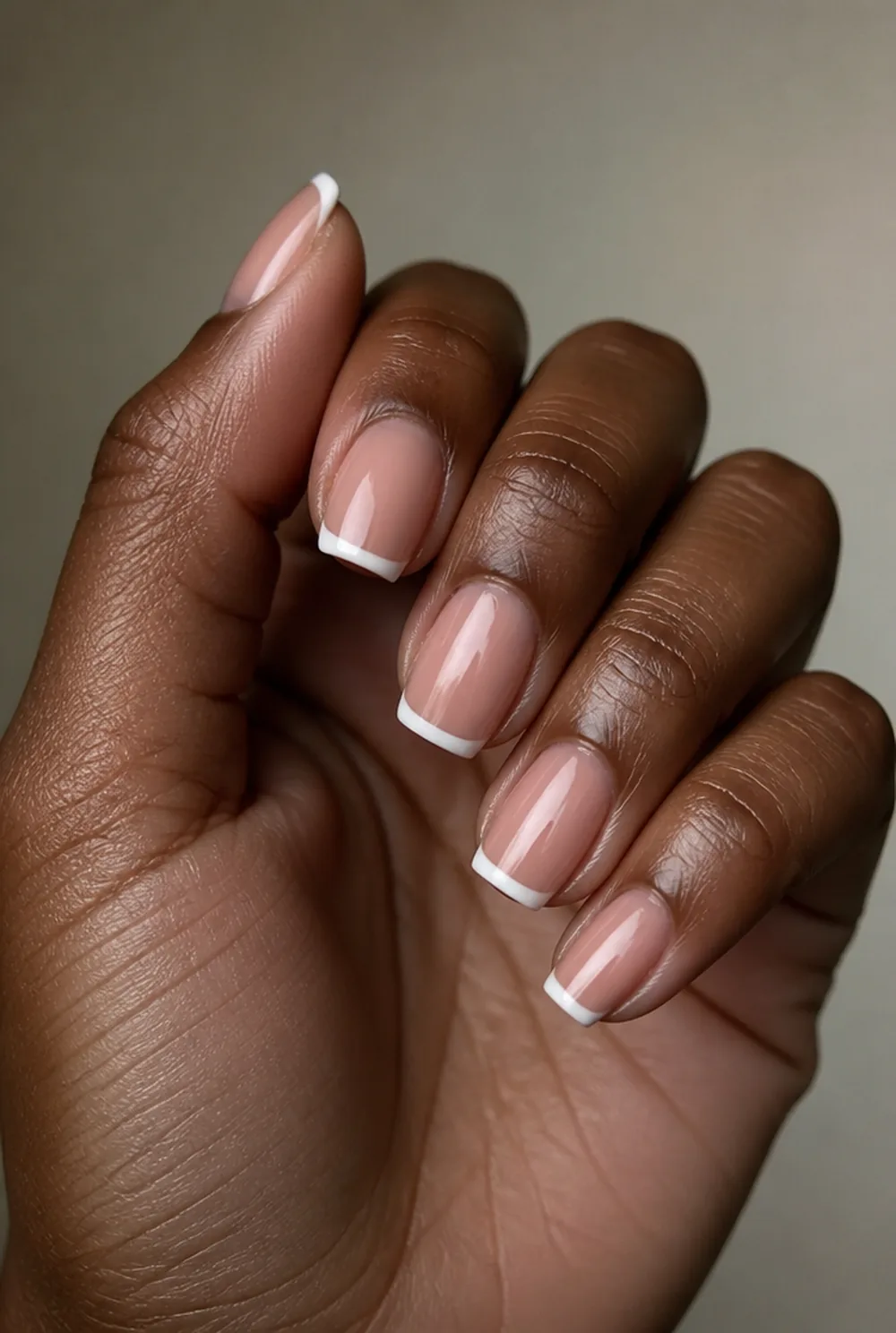 coffin french tip nail art on deep brown skin