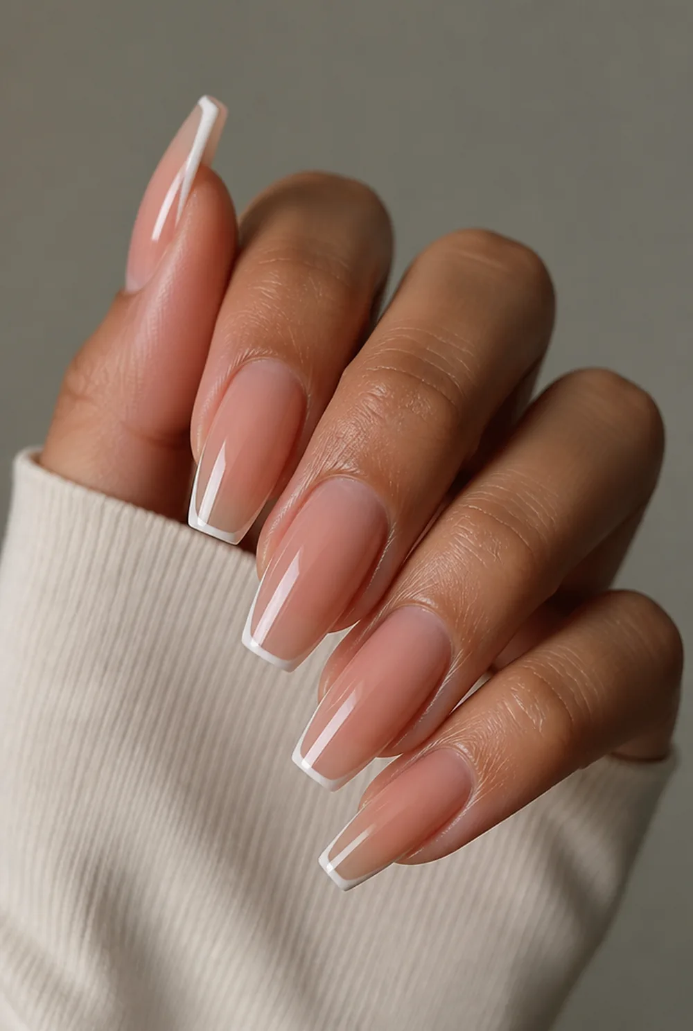 coffin french tip nail art on olive skin, long length