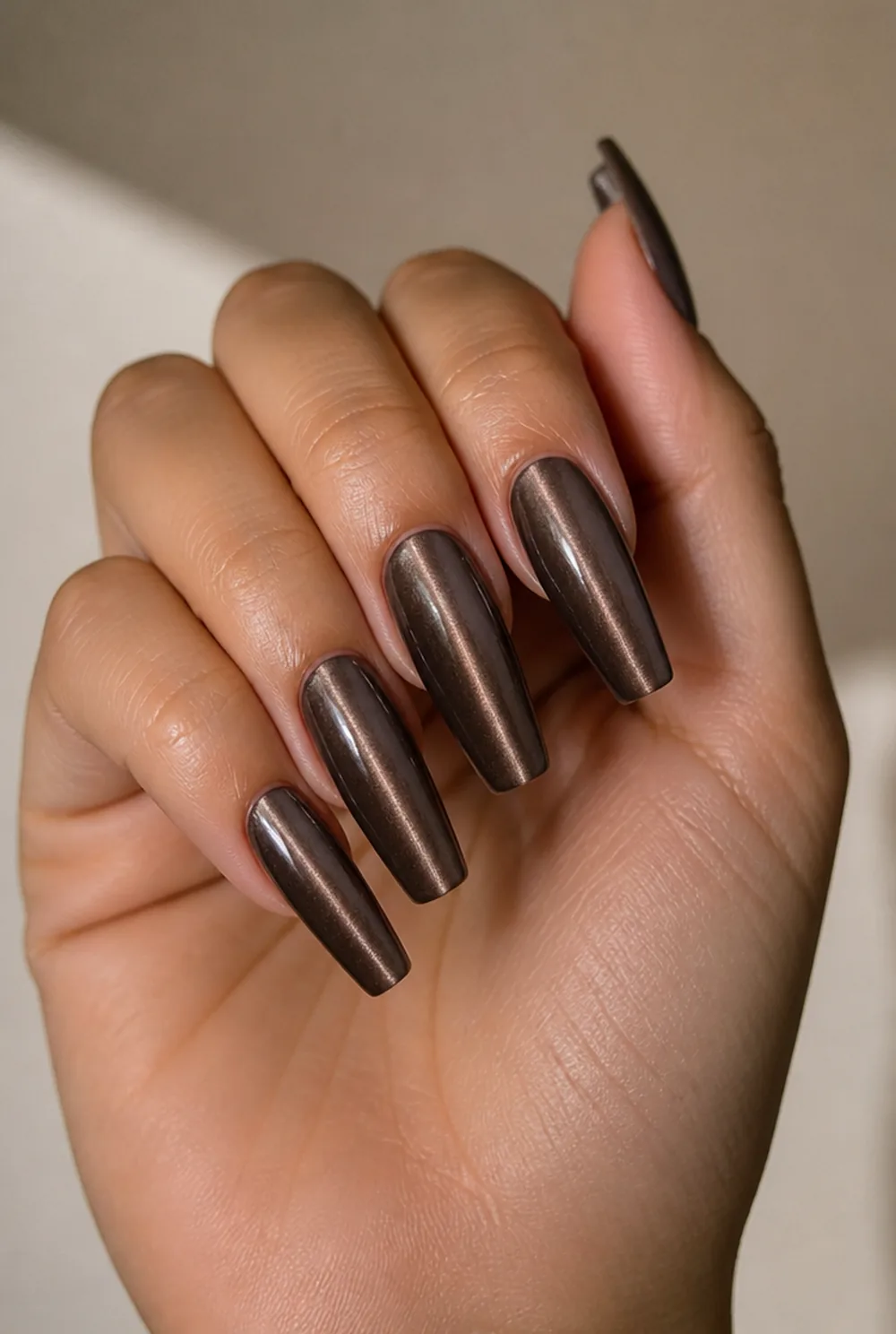 coffin cat eye nail art on olive skin, long length