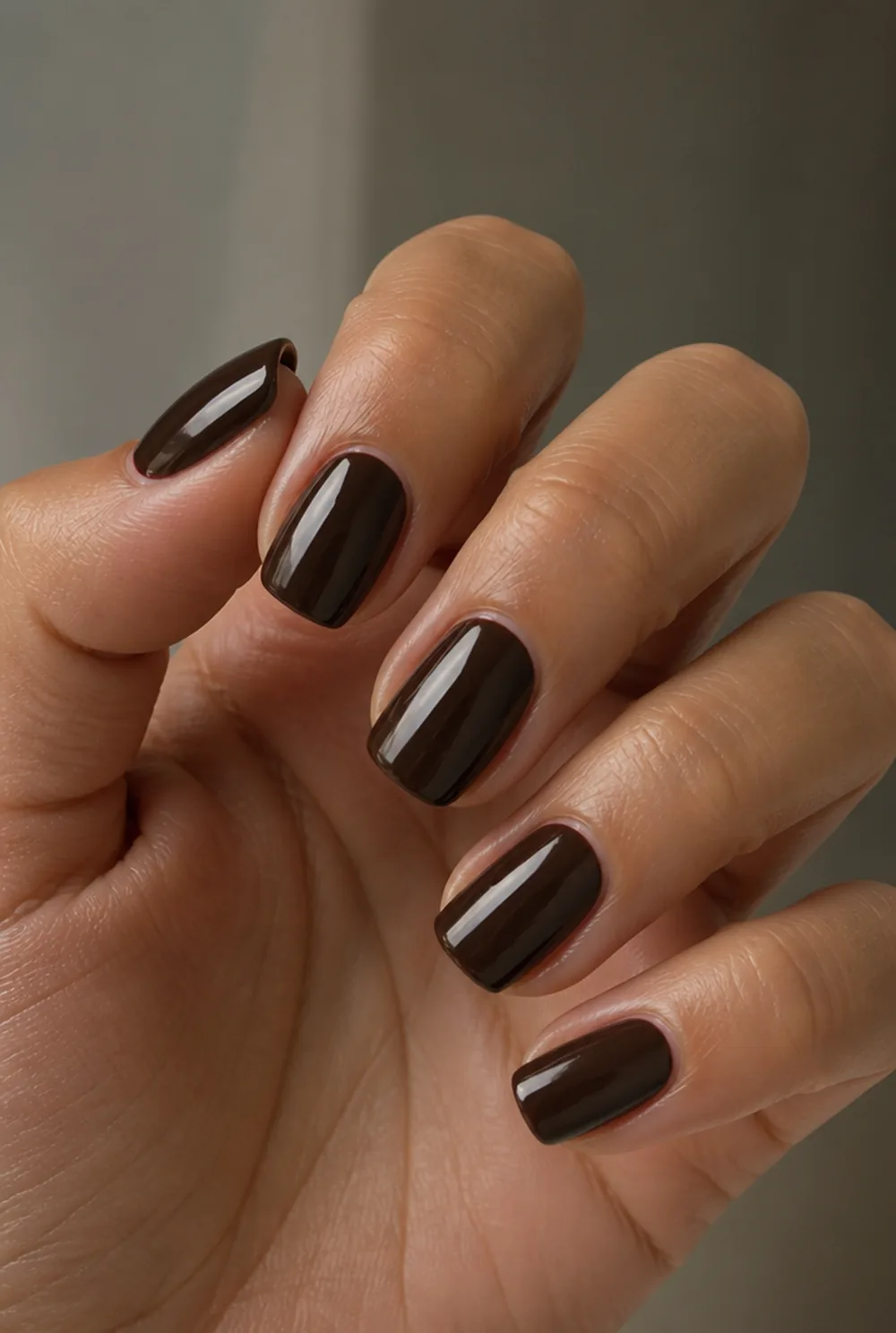 espresso brown nail art on olive skin, long length