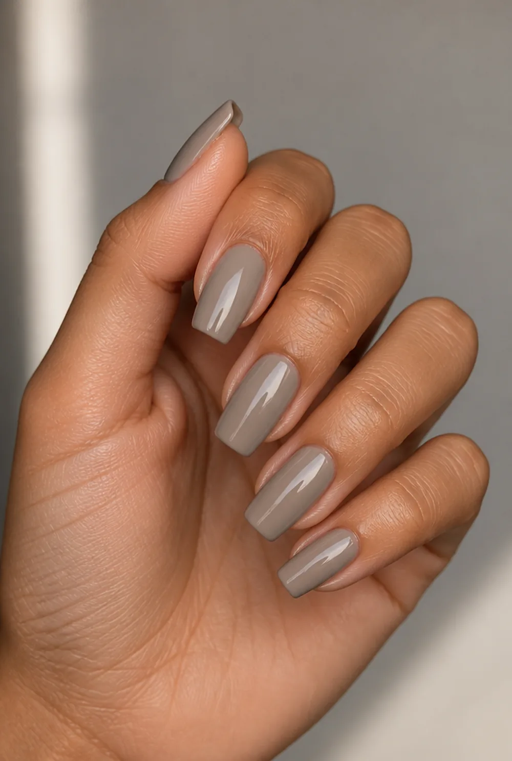 cool greige nail art on olive skin, long length